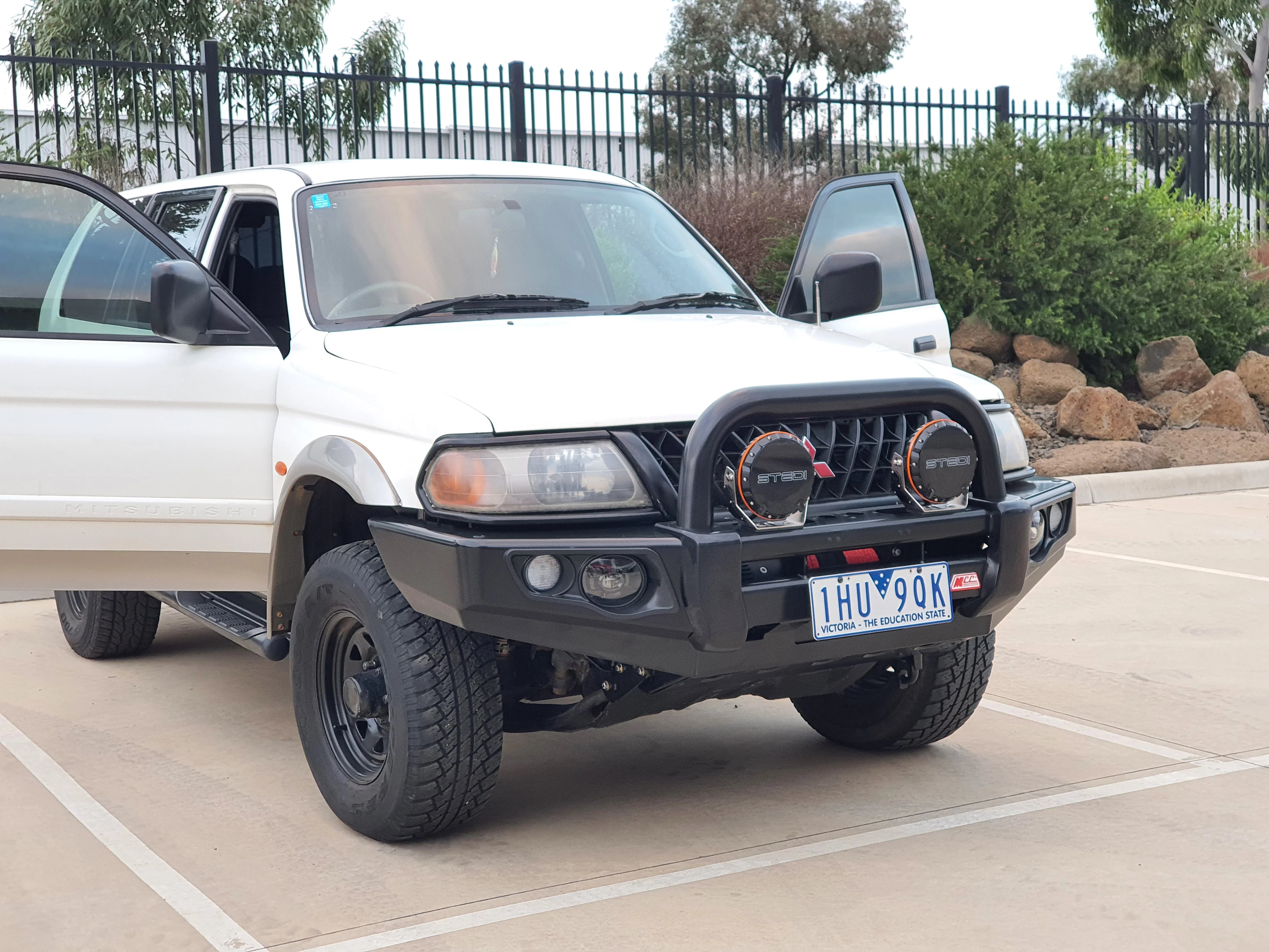 Triton/Challenger MK/PA 1996-2006 707-01 Falcon Bull Bar Single Black Loops Package (LED Foglight) - SKU MCC-02001-701SBLFOGUP